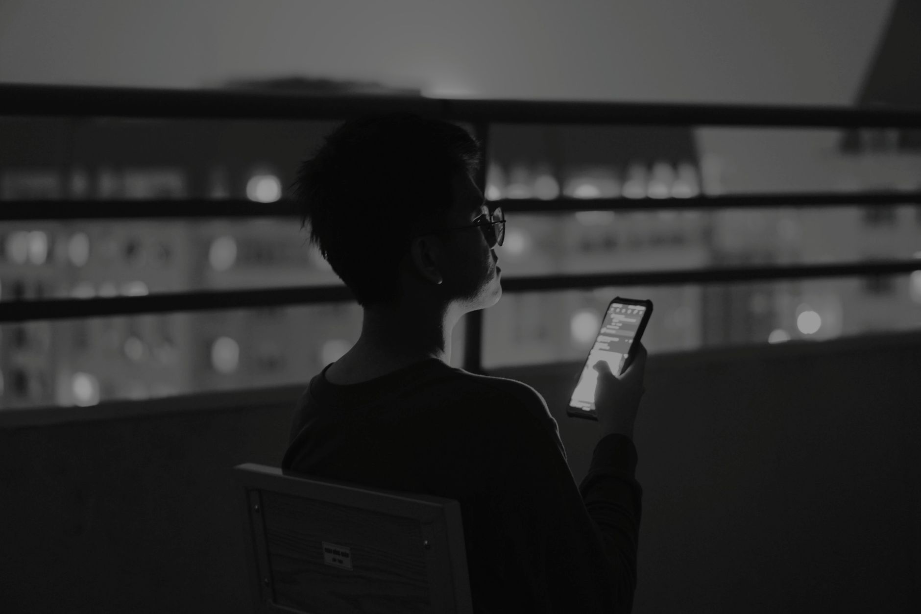 person using smartphone alone