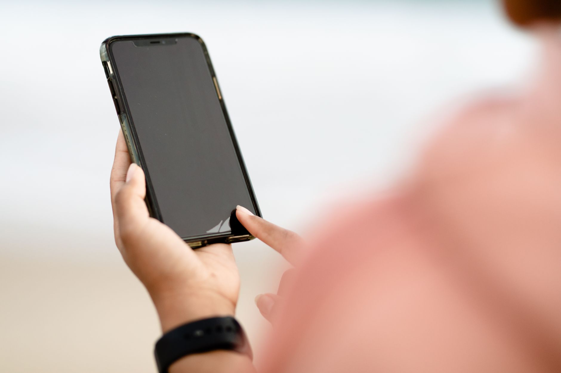 person using smartphone health technology