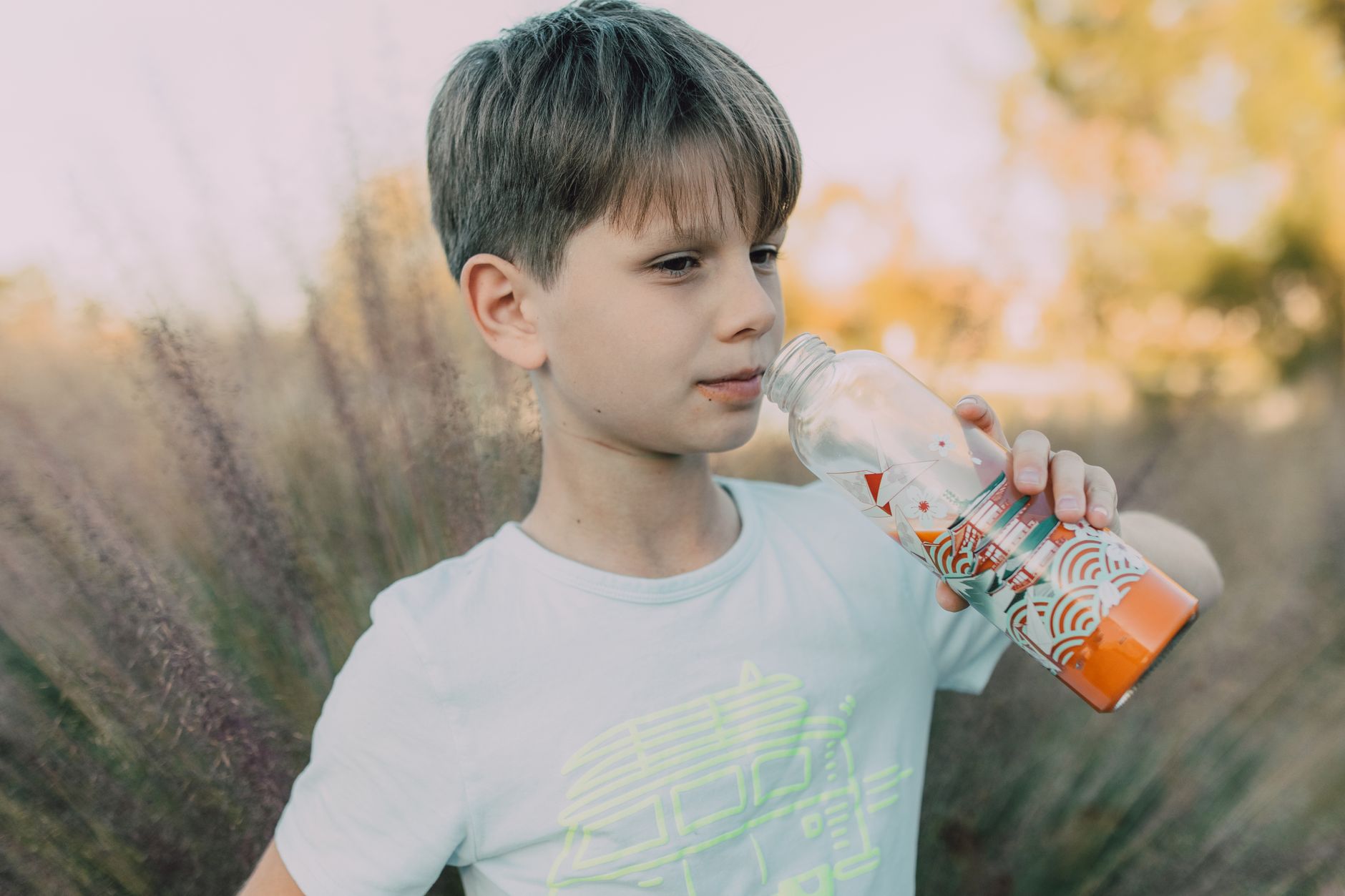 child drinking water summer