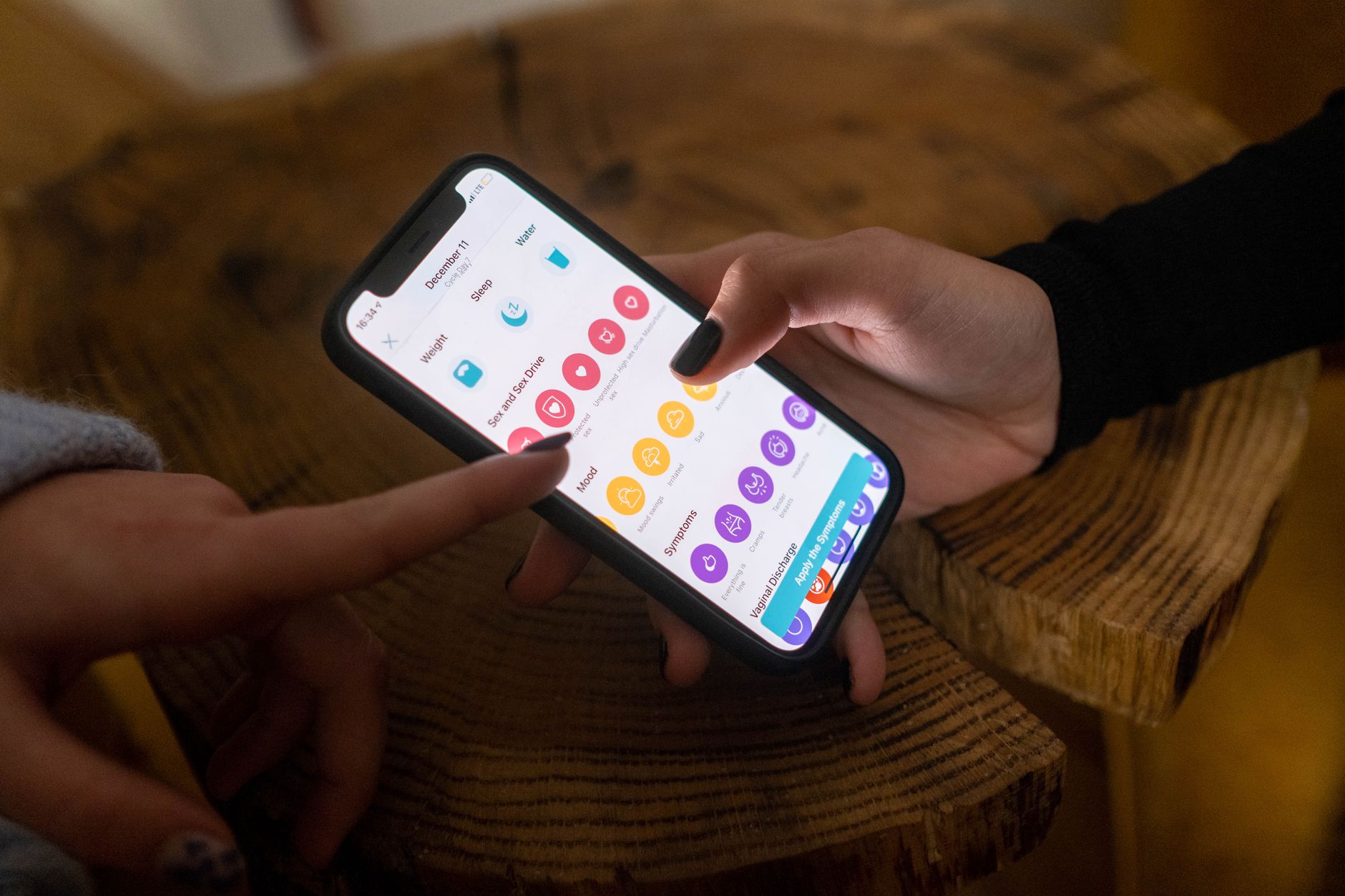 person using health app smartphone
