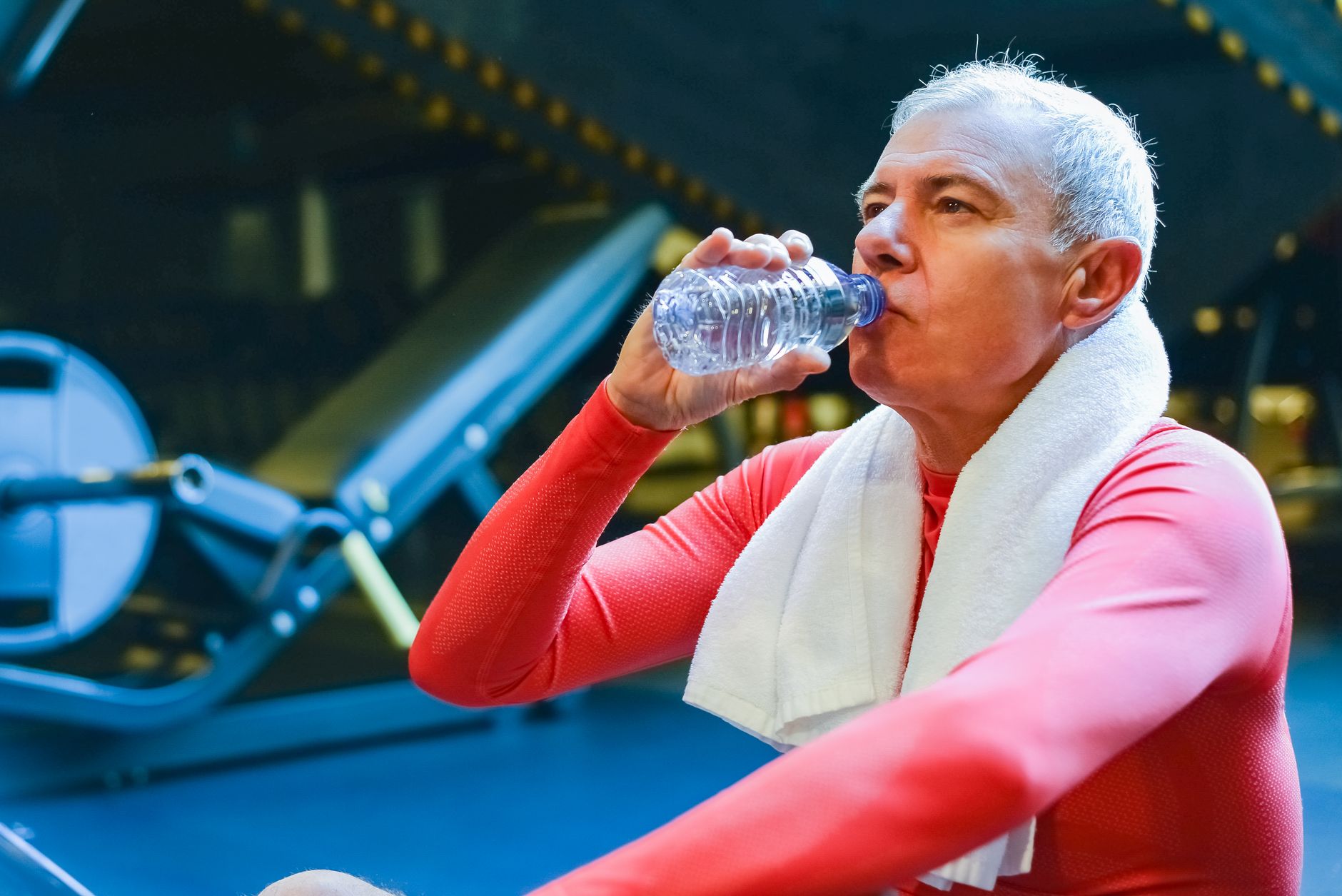 elderly person drinking water heat