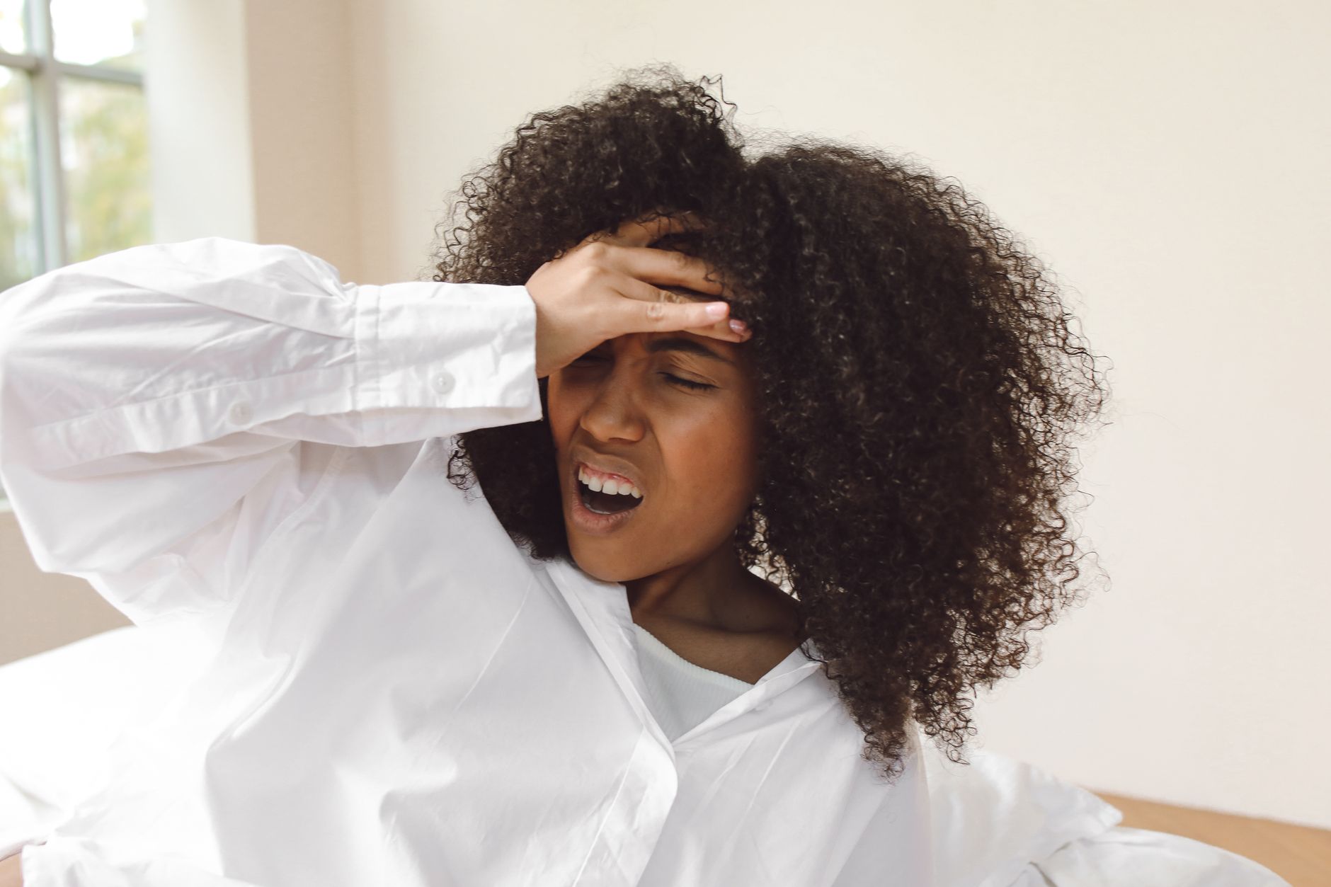 person waking up headache