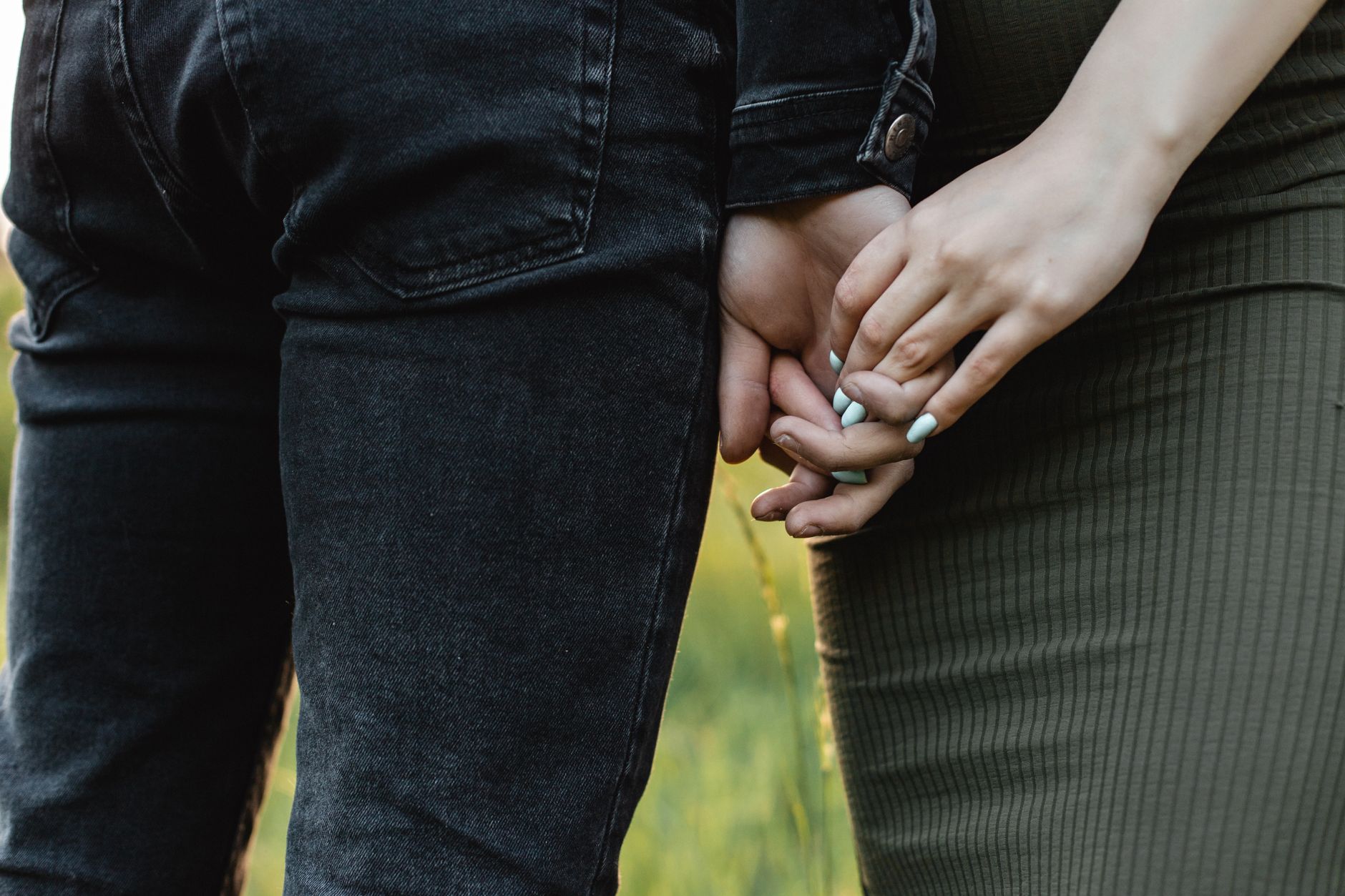 couple holding hands support