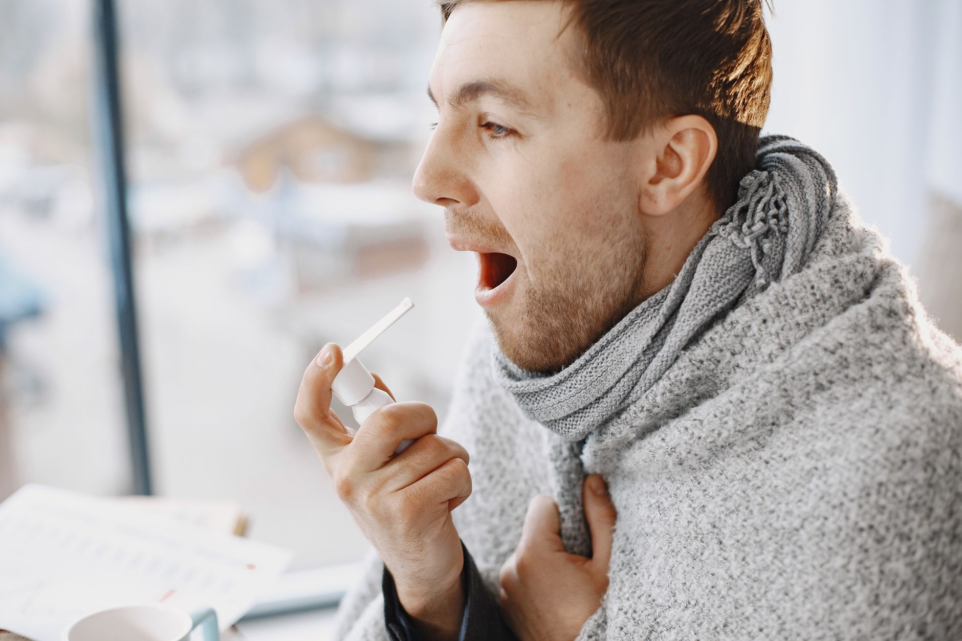 person with flu symptoms winter