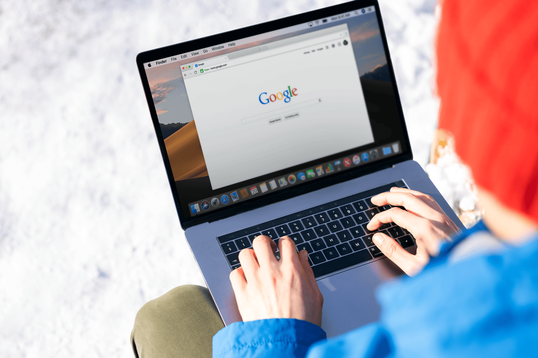 person searching health online laptop