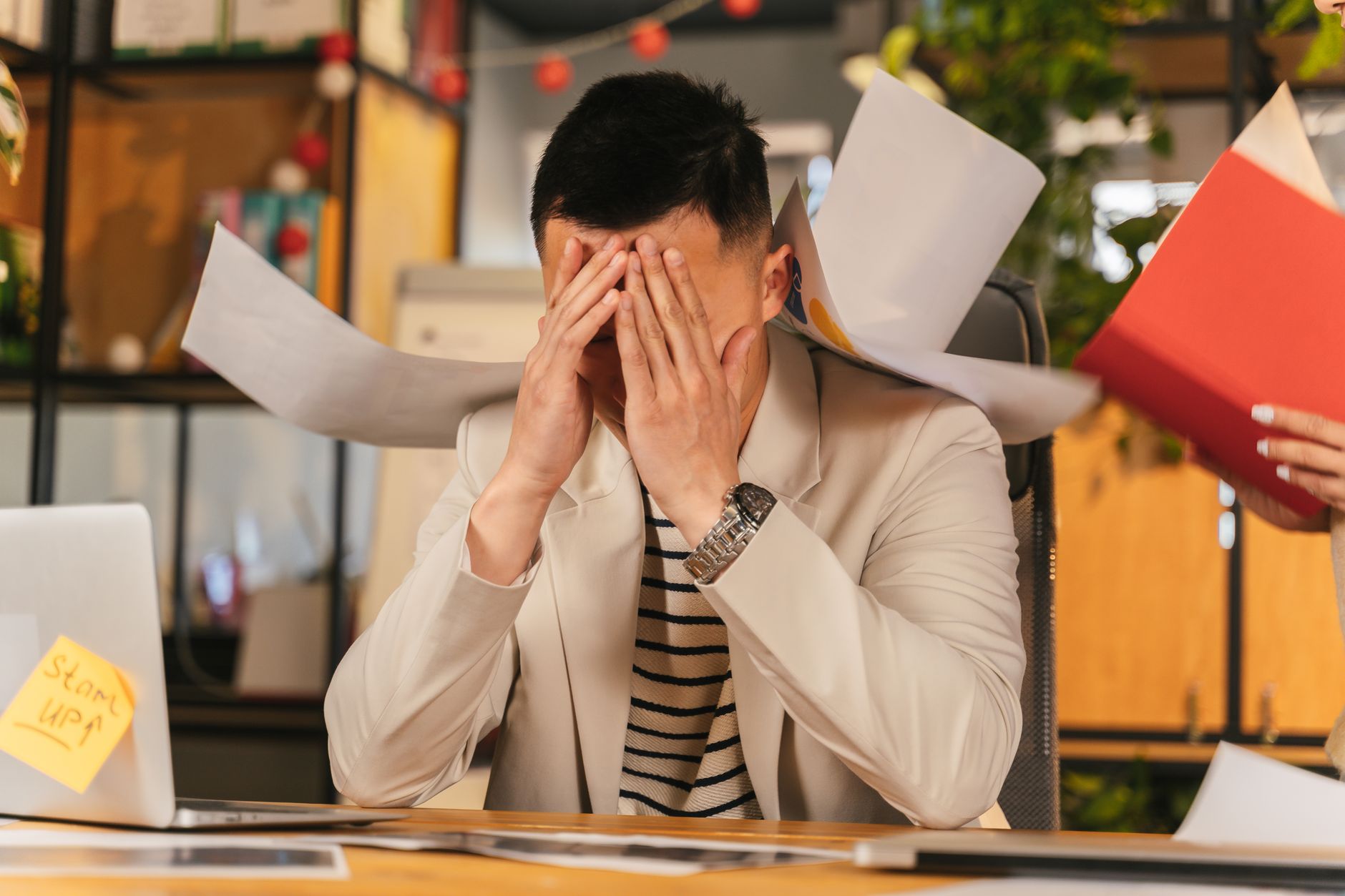 stressed office worker desk