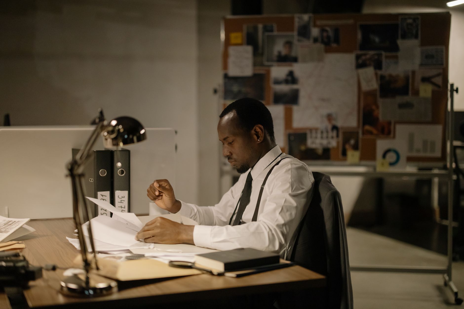 person sitting desk long hours