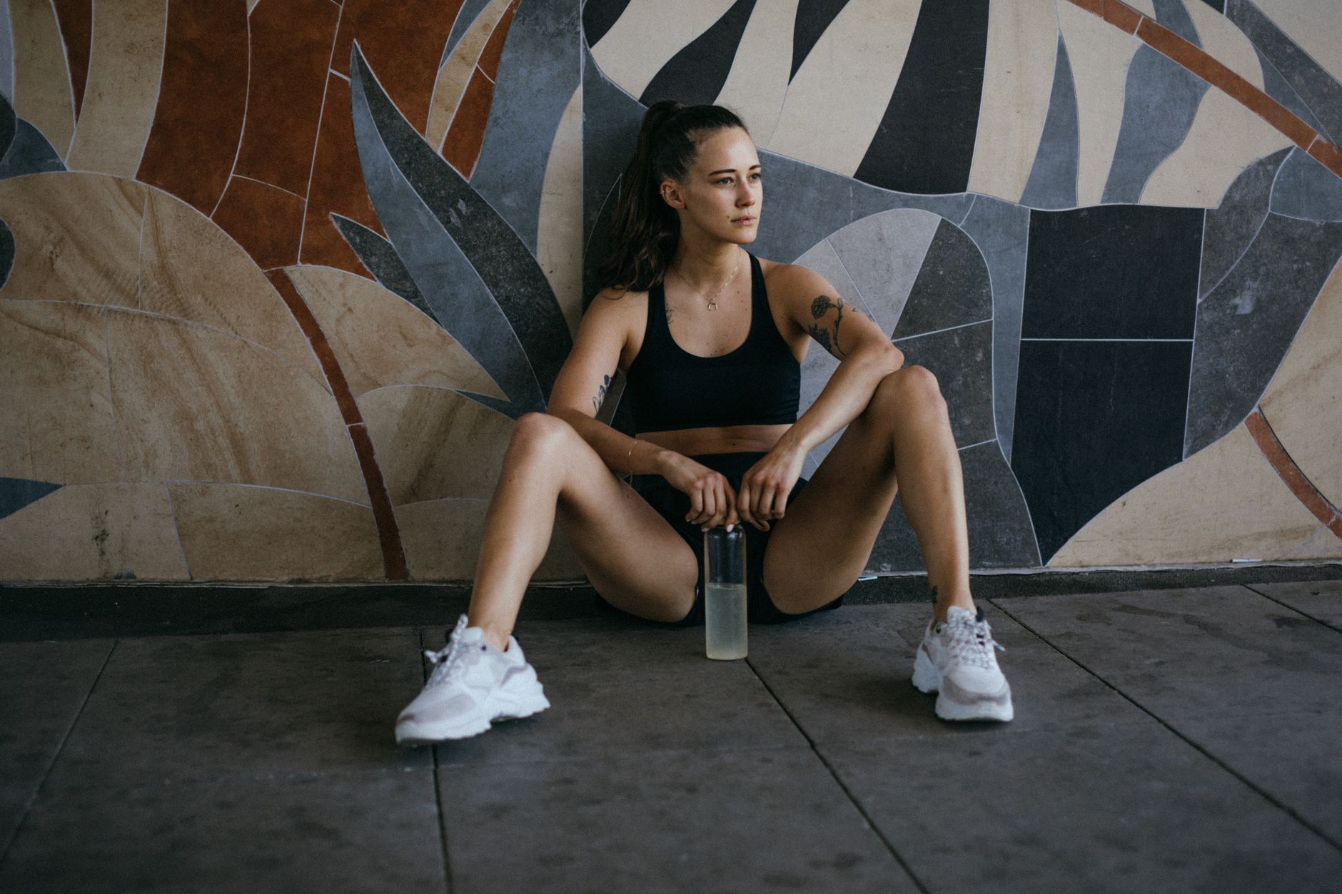 person doing wall sit exercise